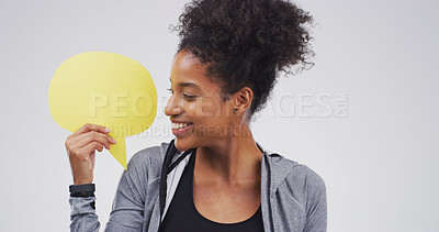 Buy stock photo Smile, woman and speech bubble sign in studio for announcement, news and signage. Mockup space, female person and icon for advertising poster, show information and billboard forum in white background