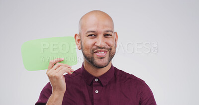 Buy stock photo Speech bubble, happy and portrait of man in studio with feedback, announcement or vote. Social media, mockup space and person from Mexico with text box, blank sign or placard by white background.