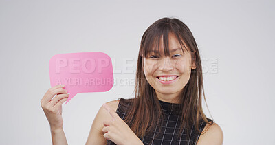 Buy stock photo Girl, speech bubble and point in studio, portrait and choice with mockup space on white background. Happy woman, excited and blank poster for feedback, decision or sign for social media in Cambodia