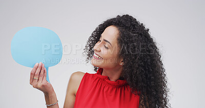 Buy stock photo Speech bubble, happy and woman in studio with feedback, announcement or vote with voice. Social media, review and person with text box, blank sign or placard by white background with mockup space.