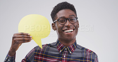 Buy stock photo Happy, black man and glasses with speech bubble in studio for chat on a white background. Male person, nerd or geek model with smile, icon or shape for quote, conversation or say on mockup space