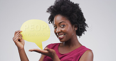 Buy stock photo Portrait, speech bubble and black woman in studio, showing and announcement on white background. African person, billboard or model with communication, info sign or voice review with chatting poster
