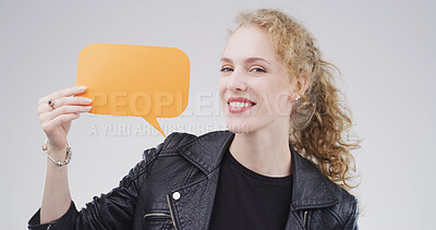 Buy stock photo Portrait, speech bubble and woman in studio, communication or billboard on white background. Person, chat poster or model with announcement, information sign or voice review with about us or feedback