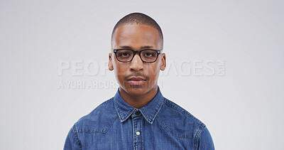 Buy stock photo Black man, portrait and student with glasses in studio for optometry on a white background. Male person, nerd or geek model with spectacles or lens for style, eyesight or accessory on mockup space