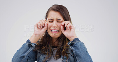 Buy stock photo Sad, crying and woman with depression in studio with stress for broken heart or fail on white background. Anxiety, unhappy person and tears for mental health crisis, bad news or breakup with space