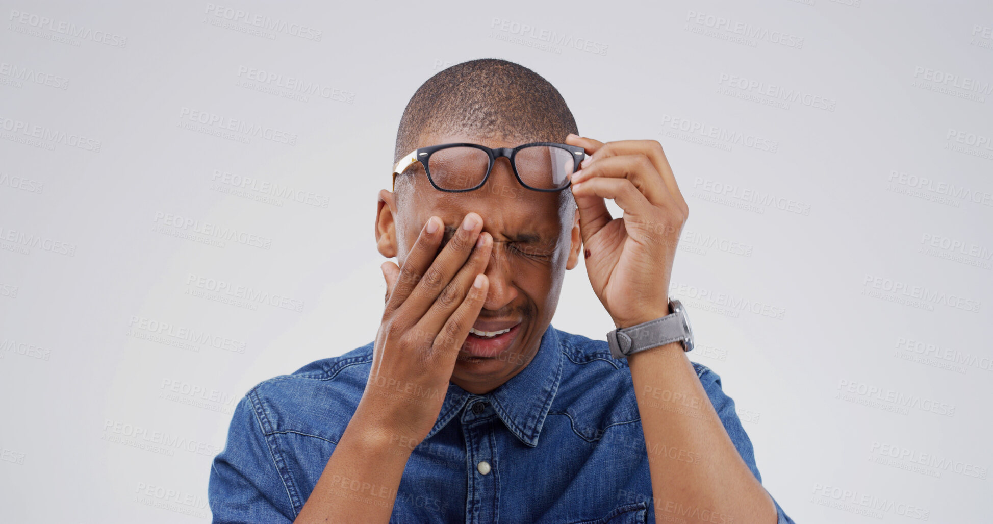 Buy stock photo Sad, black man and crying with grief in studio of bad news, mourning loss and emotional breakdown. Male person, sorrow and reaction to trauma memory, heart broken and panic attack on white background