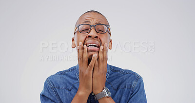 Buy stock photo Emotional, black man and crying with grief in studio for bad news, mourning loss and breakdown. Male person, sorrow and reaction for trauma memory, heart broken and panic attack on white background