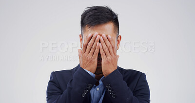 Buy stock photo Sad businessman, stress or studio with emotion for debt, mistake or bad news on a white background. Male person, model or crying with anxiety, sob or mental health for bankruptcy or financial crisis