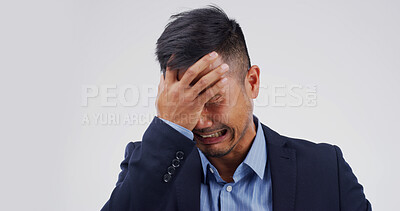Buy stock photo Crying, frustration and businessman in studio with stress for unemployment, burnout or mistake. Emotions, upset and male corporate employee with tears for loss of job or fail by white background.