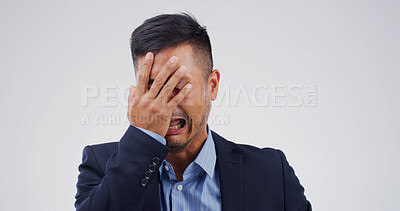 Buy stock photo Crying, upset and businessman in studio with emotions for unemployment, burnout or mistake. Stress, frustration and male corporate employee with tears for loss of job or fail by white background.