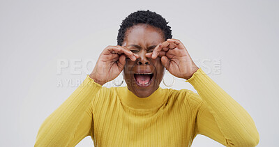 Buy stock photo Sad, black woman and crying  in studio with depression, mourning loss and emotional for memory. Female person, grief and sorrow with mental health crisis, bad news and PTSD trauma on white background