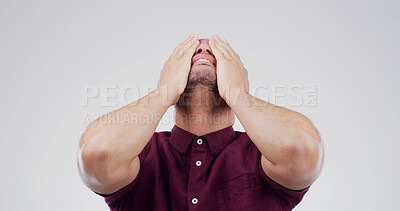 Buy stock photo Embarrassed, guilt and worry with hands on man in studio for debt crisis, challenge or gambling addict. Lottery mistake, mental health and finance loss with person on white background space for fail 