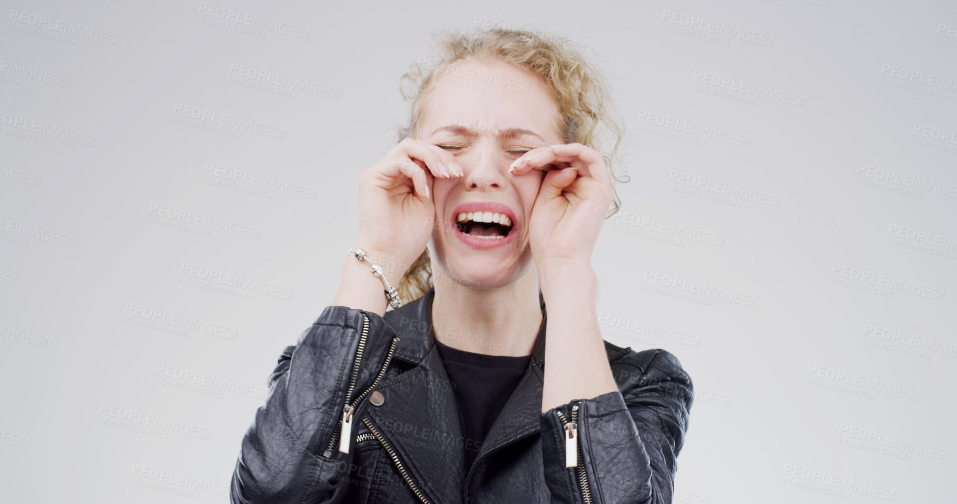 Buy stock photo Girl, crying and sad in studio with depression, grief or loss with emotion on white background. Space, tears and crisis with female person in mourning, distress with mental health and unhappy