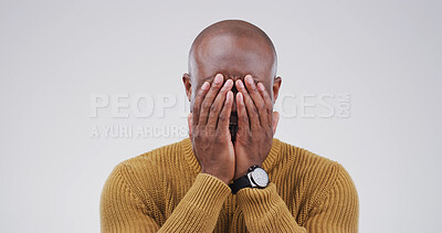 Buy stock photo Sad, black man and crying in studio with fear, mourning loss and emotional for memory. Male person, grief and sorrow with mental health crisis, bad news pain and PTSD trauma on white background