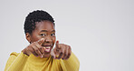 Happy, portrait or black woman with selection in studio for choice on a white background. Face, female person or African model with smile or pointing to you for lucky winner or choose on mockup space