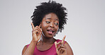 Dance, face and hand gesture with black woman on studio space for energy, excitement or having fun. Afro, celebration and music with happy person isolated on white background for event or party