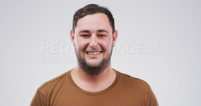 Buy stock photo Happy man, portrait and student with beard in studio for college education on a white background. Face, male person or model with smile or positive attitude for university or learning on mockup space