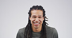 Laughing, happy and portrait of man in studio with comedy, joke or silly humor for good mood. Giggle, positive attitude and face of male person from Jamaica with funny comic by white background.