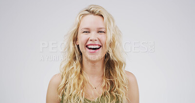 Buy stock photo Portrait, woman and laughing in studio for comedy, funny joke and reaction to meme. Happy, female person and humor with positive attitude, good vibes and silly expression on white background 