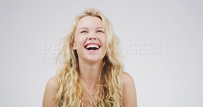 Buy stock photo Laugh, happy and face of woman on a white background with funny joke, humor and comedy. Emoji, confidence and person with laughter, joy and smile for positive attitude, cheerful and comic in studio