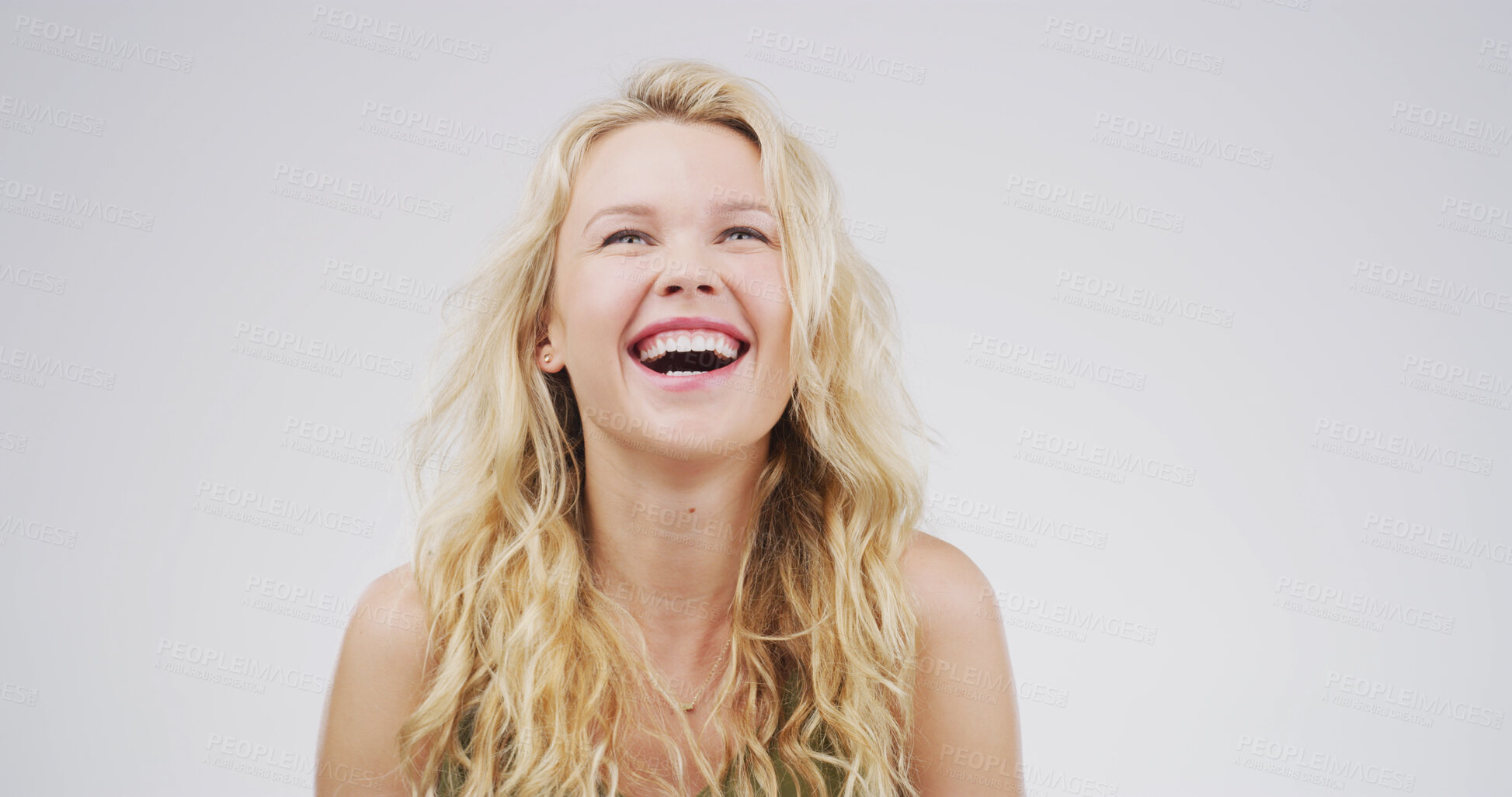 Buy stock photo Laugh, happy and face of woman on a white background with funny joke, humor and comedy. Emoji, confidence and person with laughter, joy and smile for positive attitude, cheerful and comic in studio