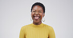 Laugh, happy and face of black woman in studio with funny joke, humor and comedy on white background. Emoji, confidence and person with laughter for positive attitude, cheerful and joy for comic