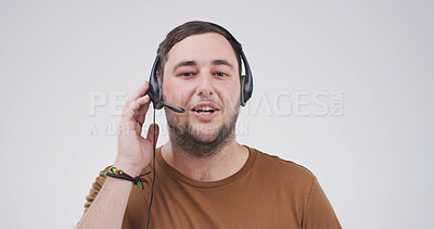 Buy stock photo Portrait, telemarketing and man in studio, consultation and customer service on white background. Business, employee and person with headset, contact us and help desk with telecom sales and talking