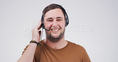 Buy stock photo Portrait, telemarketing and man in studio, smile and customer support on white background. Confidence, employee and happy person with headset, contact us and online consultation with telecom sales