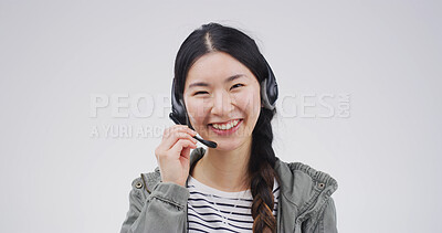 Buy stock photo Woman, portrait or headset in studio for consultation, customer support or translation service. Call center, Asian employee or happy on white background for contact, help desk or company FAQ at space