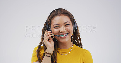 Buy stock photo Microphone, call center and portrait of woman in studio for college help desk, contact us and advice. Student support, application FAQ and campus CRM with person and headset on white background