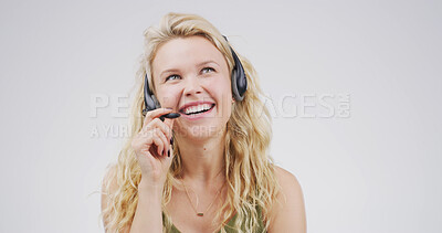 Buy stock photo Woman, laugh and headset at call centre in studio for consultation, funny client and contact us. Thinking, advisor and mic for customer service, advice and listening to comic joke on white background