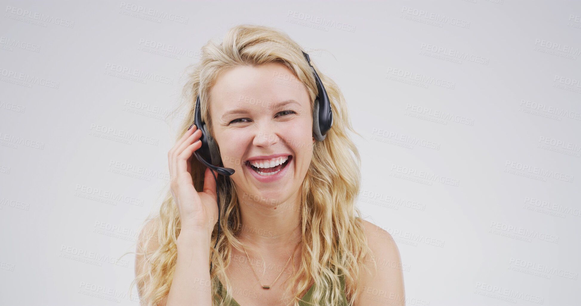Buy stock photo Portrait, woman and laugh at call centre in studio for consultation, funny client and contact us. Advisor, headset and mic for customer service, advice and listening to comic joke on white background