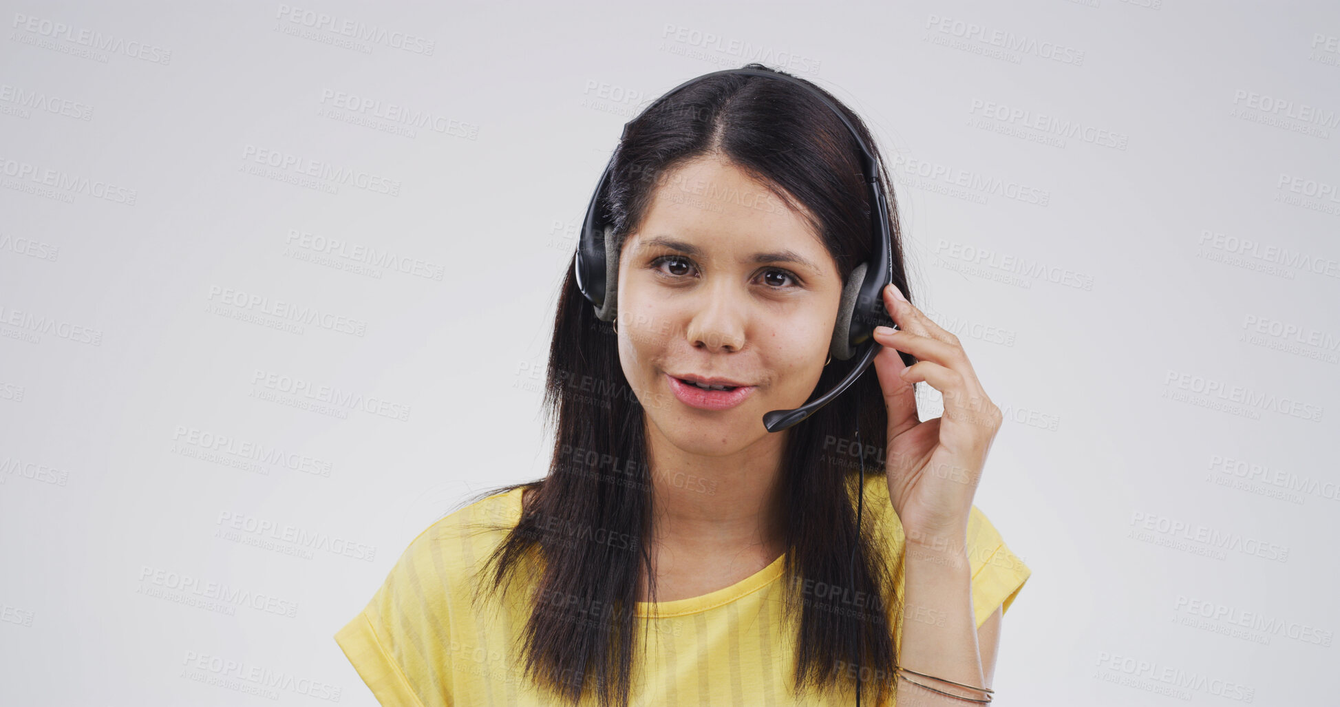 Buy stock photo Call center, woman and portrait with microphone in studio for customer service, online help or FAQ. Mockup, friendly agent and consulting client for product knowledge and advisory on white background