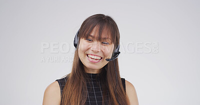 Buy stock photo Call center, woman and talking with microphone in studio for customer support, online help and FAQ. Mockup, friendly agent and consulting client for order processing or assistance on white background