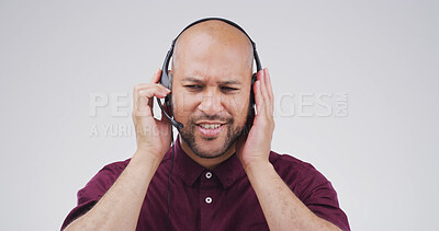 Buy stock photo Confused, listening and call center with man in studio for FAQ hotline, customer support and debt solutions. Question, virtual advisor and contact us with person on white background for loan inquiry
