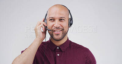 Buy stock photo Call center, man and talking on microphone in studio for lead generation, product knowledge or CRM. Mockup, friendly agent and speaking to client for online sales or telemarketing on white background