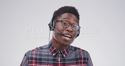 Buy stock photo Black man, portrait and headset in studio for consultation, help or online language course at space. Tutor, glasses or tech on white background for teaching, vocabulary lesson or call center in Kenya