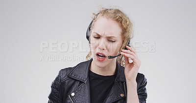 Buy stock photo Business, call centre and woman in studio, stress and customer support on white background. Person, employee or consultation with help desk, conversation and angry with feedback, upset and mistake