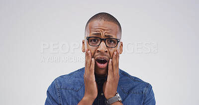 Buy stock photo Shocked, portrait and black man in studio with face expression, bad news or negative announcement. Omg, surprise and mouth open for gossip, drama and feedback or review of fail on a white background