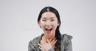 Buy stock photo Shock, winner and portrait with asian woman in studio for excited, scholarship or deans list announcement. Surprise, academic merit and student reward with person on white background space for news