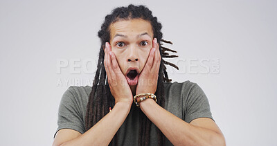 Buy stock photo Shocked, man and amazed by gossip, portrait or reaction to announcement, rumor and white background. Surprised, African person and mouth open for news, studio or revelation of drama, listening or wow
