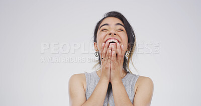 Buy stock photo Woman, surprised and happy in studio for announcement, good news and relief at space. Person, exhilarated and smile on white background for achievement, creative opportunity and yes for winning