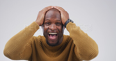 Buy stock photo Happy, black man and portrait with surprise or emotion for winning in studio on a white background. Excited, male person or African model with shock or joy for good news, promotion or lucky winner