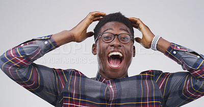 Buy stock photo Excited, black man and portrait with surprise or emotion for winning in studio on a white background. Happy, male person or African model with shock or joy for good news, promotion or lucky winner