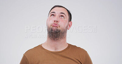 Buy stock photo Comic, expression and funny face with man on studio space for emotions, humor or silly joke. Comedy, emoji and unique with goofy person isolated on white background for crazy or quirky reaction