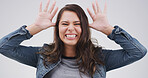Goofy, happy and portrait of woman in studio with tease, silly and comic facial expression. Crazy, joke and face of female person from Canada with comedy gesture for funny humor by white background.