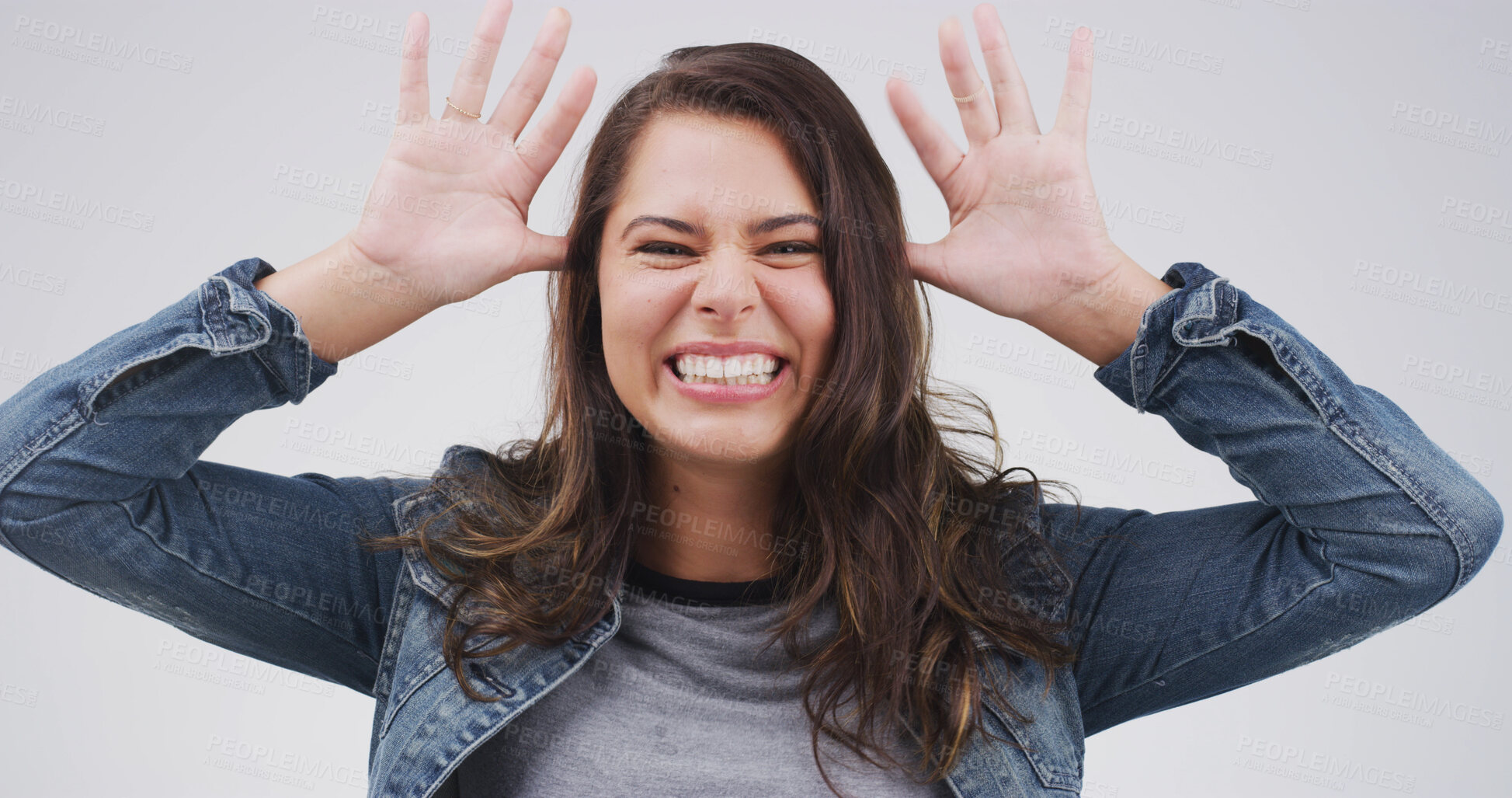 Buy stock photo Goofy, happy and portrait of woman in studio with tease, silly and comic facial expression. Crazy, joke and face of female person from Canada with comedy gesture for funny humor by white background.