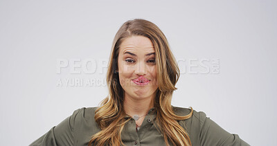 Buy stock photo Tongue out, silly and portrait of woman in studio for funny face, humor and comedy on white background. Happy, mockup space and isolated person with reaction, facial expression and emoji for joke