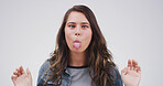 Portrait, funny face and woman in studio with tongue out on white background. Silly, goofy eyes and person with crazy gesture, emoji expression and model with playful comedy for comic humor in Canada