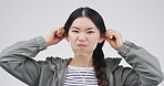 Studio, portrait and woman with funny face, silly or facial expression for humor,  gesture or comic. White background, emoji and Asian person with reaction for comedy, goofy and confident in China